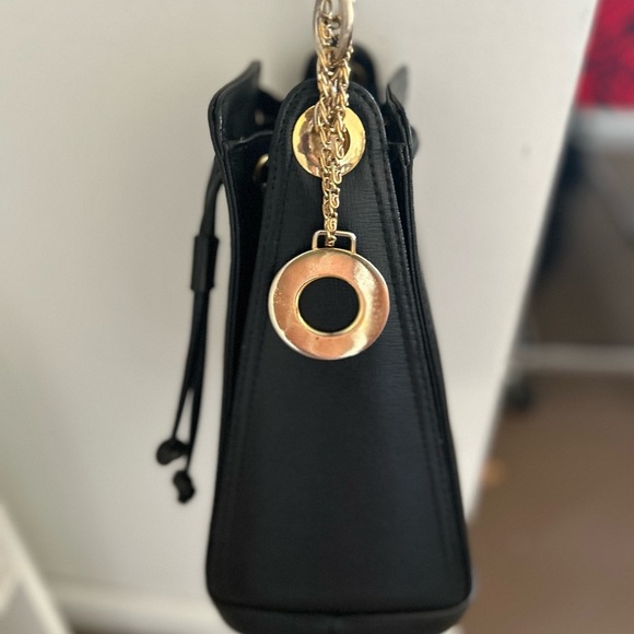 Small Black Crossbody Bag with Gold Accents and Drawstring Closure - Picture 3 of 13